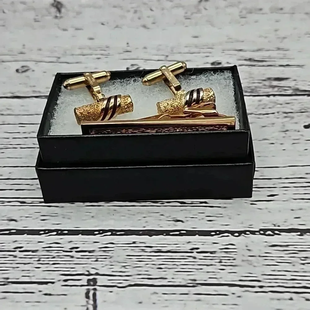 Christian Dior Gold Tone Cufflinks and Tie Bar Set